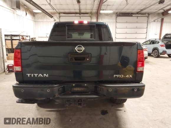 ✅ 2015 Nissan Titan SV • VIN: 1N6AA0ECXFN507338 • Lot: 43703382. Listed on IAAI with 176,222 mi. Free auction sales archive from the USA and detailed vehicle history report at DreamBid. Image 17.
