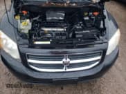 ✅ 2010 Dodge Caliber Mainstreet • VIN: 1B3CB3HA2AD587982 • Лот: 81044184. Опубликован ранее на Copart с пробегом 110 281 миль. Бесплатный доступ к архиву аукционных продаж из США и подробный отчёт об истории автомобиля на DreamBid. Изображение 11.