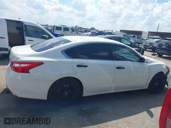 ✅ 2016 Nissan Altima SR • VIN: 1N4AL3AP4GC235119 • Lot: 43379591. Listed on IAAI with 165,546 mi. Free auction sales archive from the USA and detailed vehicle history report at DreamBid. Image 13.