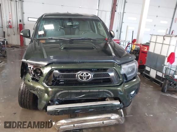 ✅ 2012 Toyota Tacoma • VIN: 3TMLU4EN2CM094154 • Lot: 41322227. Listed on IAAI with 270,712 mi. Free auction sales archive from the USA and detailed vehicle history report at DreamBid. Image 13.