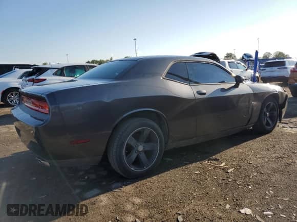 2014 Dodge Challenger SXT z VIN 2C3CDYAG7EH244876, wystawiony jako Copart lot #68067264 z przebiegiem 130 669 mil mil oraz Czysty tytuł • Clean title. Historia ofert i sprzedaży dostępna na DreamBid. Obrazek 3.