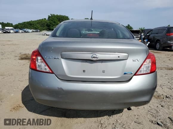 ✅ 2012 Nissan Versa SV • VIN: 3N1CN7AP5CL903791 • Lot: 59574345. Listed on Copart with 141,536 mi. Free auction sales archive from the USA and detailed vehicle history report at DreamBid. Image 6.