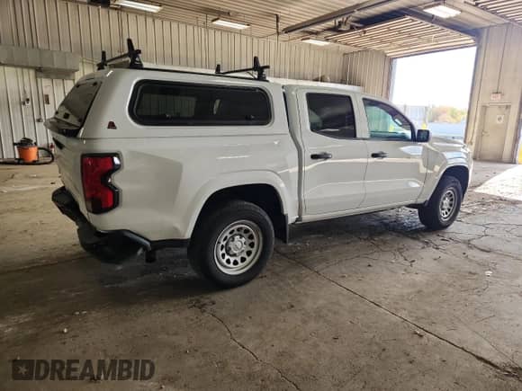 2023 Chevrolet Colorado 2WD Work Truck z VIN 1GCPSBEK1P1138035, wystawiony jako Copart lot #90450115 z przebiegiem 77 080 mil mil oraz Nie do naprawy • Non repairable. Historia ofert i sprzedaży dostępna na DreamBid. Obrazek 3.