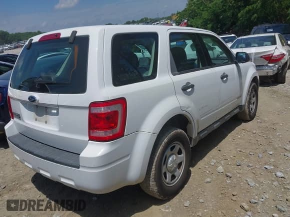 ✅ 2008 Ford Escape XLS • VIN: 1FMCU02Z18KD39486 • Lot: 42311893. Listed on IAAI with 145,210 mi. Free auction sales archive from the USA and detailed vehicle history report at DreamBid. Image 4.