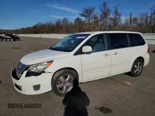 ✅ 2011 Volkswagen Routan SE • VIN: 2V4RW3DG7BR740318 • Lot: 93069845. Listed on Copart with 262,581 mi. Free auction sales archive from the USA and detailed vehicle history report at DreamBid. Image 1.