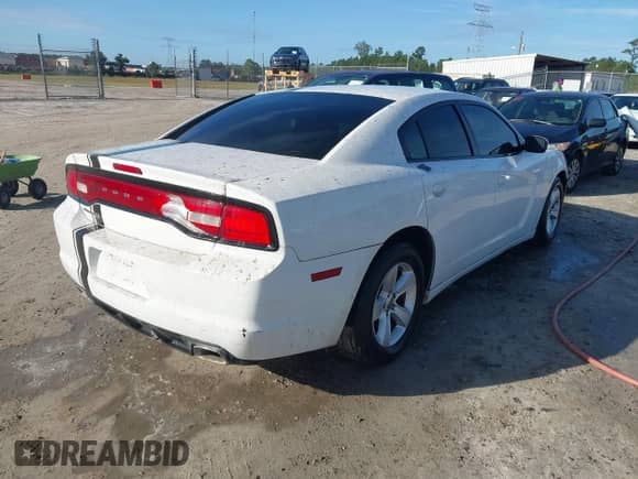 2012 Dodge Charger SE with VIN 2C3CDXBG4CH217849, listed as a IAAI auction lot 43410712 with 217,716 mi miles and . Bid and sale history available at DreamBid. Image 4.