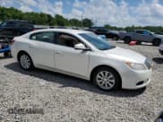 ✅ 2011 Buick LaCrosse CX • VIN: 1G4GA5EDXBF335556 • Lot: 64633855. Listed on Copart with 130,605 mi. Free auction sales archive from the USA and detailed vehicle history report at DreamBid. Image 4.