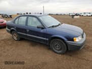 ✅ 1999 Toyota Tercel • VIN: JT2BC53LXX0366733 • Lot: 93113075. Listed on Copart with 163,435 mi. Free auction sales archive from the USA and detailed vehicle history report at DreamBid. Image 4.