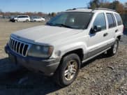 ✅ 2003 Jeep Grand Cherokee Laredo • VIN: 1J4GW48S63C611304 • Lot: 43611521. Listed on IAAI with 116,173 mi. Free auction sales archive from the USA and detailed vehicle history report at DreamBid. Image 2.