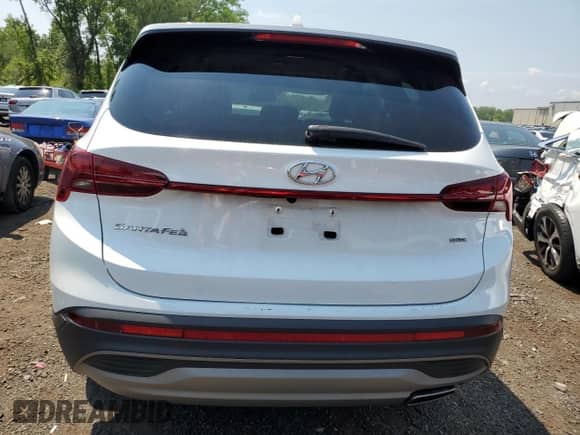 2022 Hyundai Santa Fe SE z VIN 5NMS1DAJ6NH386967, wystawiony jako Copart lot #62485124 z przebiegiem 27 442 mil mil oraz Szkoda całkowita • Salvage title. Historia ofert i sprzedaży dostępna na DreamBid. Obrazek 6.