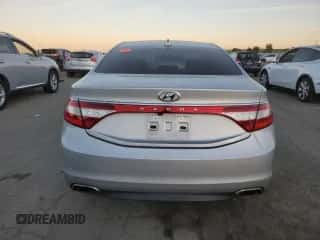 2016 Hyundai Azera z VIN KMHFG4JG4GA563397, wystawiony jako Copart lot #87879325 z przebiegiem 58 528 mil mil oraz Szkoda całkowita • Salvage title. Historia ofert i sprzedaży dostępna na DreamBid. Obrazek 6.