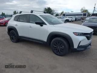 ✅ 2023 Mazda CX-50 S Preferred Plus • VIN: 7MMVABCM3PN133636 • Lot: 43424123. Listed on IAAI with 28,546 mi. Free auction sales archive from the USA and detailed vehicle history report at DreamBid. Image 1.