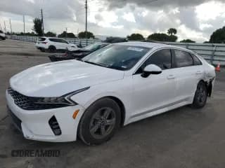 ✅ 2022 Kia K5 LX • VIN: 5XXG24J21NG110769 • Лот: 85915705. Опубликован ранее на Copart с пробегом 96 769 миль. Бесплатный доступ к архиву аукционных продаж из США и подробный отчёт об истории автомобиля на DreamBid. Изображение 1.