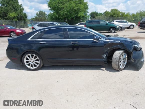 ✅ 2016 Lincoln MKZ • VIN: 3LN6L2J93GR632474 • Lot: 42607060. Listed on IAAI with 99,490 mi. Free auction sales archive from the USA and detailed vehicle history report at DreamBid. Image 13.