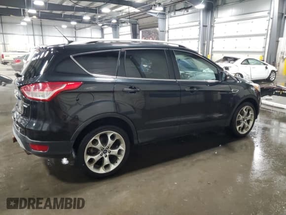 ✅ 2015 Ford Escape Titanium • VIN: 1FMCU9J90FUC25986 • Lot: 89878505. Listed on Copart with 127,376 mi. Free auction sales archive from the USA and detailed vehicle history report at DreamBid. Image 3.
