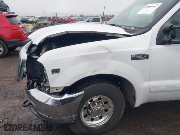✅ 2001 Ford F-350 • VIN: 3FTSW30S81MA57801 • Lot: 43806662. Wystawiony na IAAI z przebiegiem 184 408 mil. Bezpłatny archiwum sprzedaży aukcyjnych z USA i szczegółowy raport historii pojazdu na DreamBid. Zdjęcie 18.