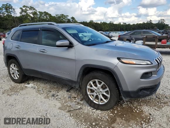 ✅ 2014 Jeep Cherokee Latitude • VIN: 1C4PJMCS1EW246222 • Lot: 86528535. Listed on Copart with 185,412 mi. Free auction sales archive from the USA and detailed vehicle history report at DreamBid. Image 4.