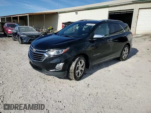 ✅ 2018 Chevrolet Equinox Premier • VIN: 2GNAXMEV6J6132420 • Lot: 89735055. Listed on Copart with 112,975 mi. Free auction sales archive from the USA and detailed vehicle history report at DreamBid. Image 14.