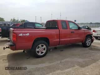 2007 Dodge Dakota SLT с VIN 1D7HW42P07S124311, выставлен на аукционе Copart как лот 64675114 с пробегом 145 567 миль миль и На запчасти • Non repairable. История ставок и продаж доступна на DreamBid. Изображение 3.