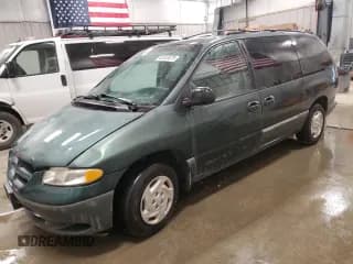 ✅ 1999 Dodge Caravan SE • VIN: 1B4GT44L4XB913292 • Lot: 63410075. Listed on Copart with 116,396 mi. Free auction sales archive from the USA and detailed vehicle history report at DreamBid. Image 1.