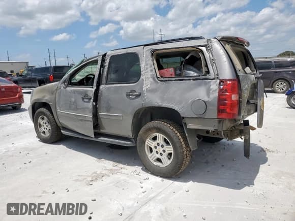 ✅ 2007 Chevrolet Tahoe LS • VIN: 1GNFC13C07J340290 • Lot: 61860395. Listed on Copart with 207,574 mi. Free auction sales archive from the USA and detailed vehicle history report at DreamBid. Image 2.
