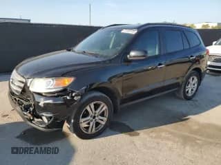 2012 Hyundai Santa Fe Limited с VIN 5XYZK4AG6CG167448, выставлен на аукционе Copart как лот 81599105 с пробегом 279 150 миль миль и Списание • Salvage title. История ставок и продаж доступна на DreamBid. Изображение 1.
