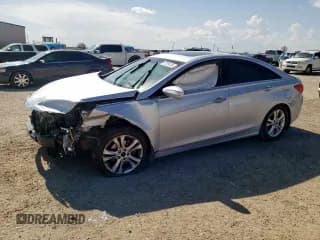 ✅ 2013 Hyundai Sonata Limited • VIN: 5NPEC4ACXDH787996 • Lot: 57359105. Listed on Copart with 126,345 mi. Free auction sales archive from the USA and detailed vehicle history report at DreamBid. Image 1.