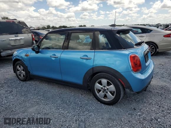 ✅ 2016 MINI Hardtop 4 Door • VIN: WMWXU1C52G2D08396 • Lot: 61060415. Listed on Copart with 138,903 mi. Free auction sales archive from the USA and detailed vehicle history report at DreamBid. Image 2.