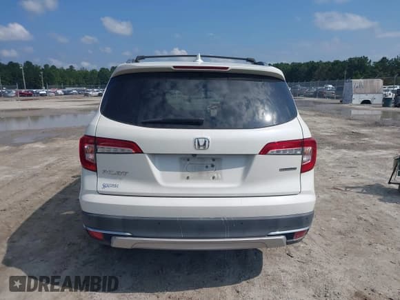 ✅ 2019 Honda Pilot Touring 8-Passenger • VIN: 5FNYF5H9XKB001842 • Lot: 43026784. Listed on IAAI with 114,674 mi. Free auction sales archive from the USA and detailed vehicle history report at DreamBid. Image 17.