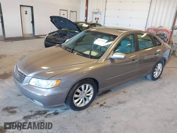 2007 Hyundai Azera SE с VIN KMHFC46F87A173110, выставлен на аукционе IAAI как лот 42275974 с пробегом 208 901 миль миль и . История ставок и продаж доступна на DreamBid. Изображение 2.