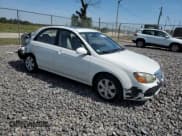 ✅ 2009 Kia Spectra EX • VIN: KNAFE221595597074 • Lot: 71874735. Listed on Copart with 204,954 mi. Free auction sales archive from the USA and detailed vehicle history report at DreamBid. Image 4.