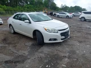 ✅ 2015 Chevrolet Malibu LTZ • VIN: 1G11F5SL0FF220857 • Lot: 42107647. Listed on IAAI with 143,330 mi. Free auction sales archive from the USA and detailed vehicle history report at DreamBid. Image 1.