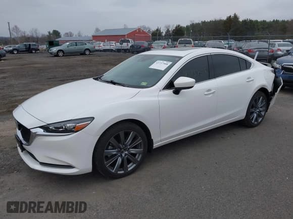 ✅ 2021 Mazda 6 Grand Touring • VIN: JM1GL1TY1M1616447 • Lot: 43737508. Listed on IAAI with 31,293 mi. Free auction sales archive from the USA and detailed vehicle history report at DreamBid. Image 2.