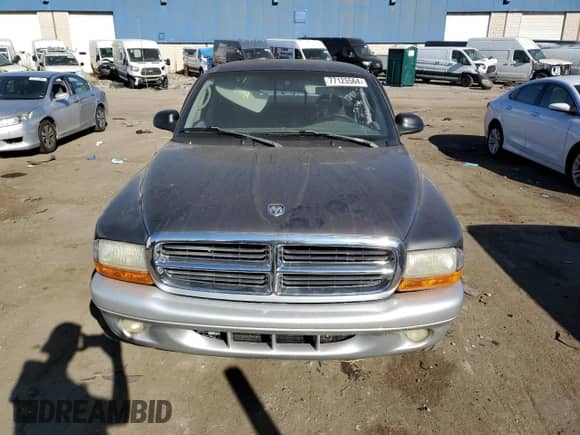 2002 Dodge Dakota SLT с VIN 1B7GL42X72S584170, выставлен на аукционе Copart как лот 77125564 с пробегом Не указан миль и Списание • Salvage title. История ставок и продаж доступна на DreamBid. Изображение 5.