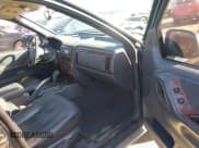 ✅ 1999 Jeep Grand Cherokee Laredo • VIN: 1J4G258S7XC797734 • Lot: 40992707. Wystawiony na IAAI z przebiegiem 207 425 mil. Bezpłatny archiwum sprzedaży aukcyjnych z USA i szczegółowy raport historii pojazdu na DreamBid. Zdjęcie 5.