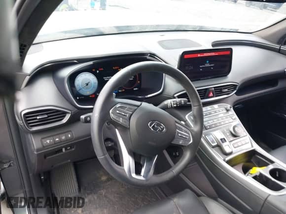 2023 Hyundai Santa Fe Calligraphy with VIN 5NMS54AL5PH613137, listed as a IAAI auction lot 43221208 with 28,585 mi miles and . Bid and sale history available at DreamBid. Image 21.