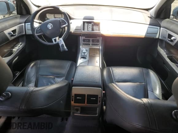 ✅ 2013 Jaguar XF RWD • VIN: SAJWA0E77D8S91277 • Lot: 63109595. Listed on Copart with 81,735 mi. Free auction sales archive from the USA and detailed vehicle history report at DreamBid. Image 8.