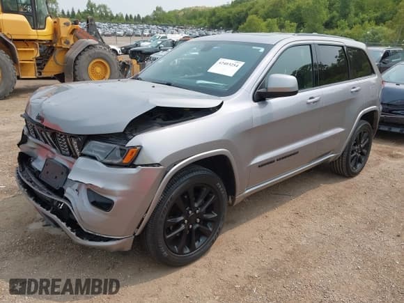 ✅ 2020 Jeep Grand Cherokee Laredo E • VIN: 1C4RJFAG7LC427620 • Lot: 42403254. Listed on IAAI with 34,414 mi. Free auction sales archive from the USA and detailed vehicle history report at DreamBid. Image 17.