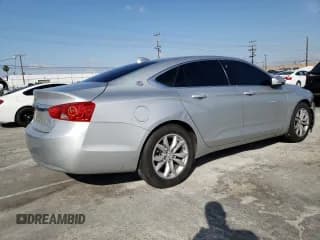 ✅ 2016 Chevrolet Impala LT • VIN: 2G1105SA5G9196128 • Лот: 52418034. Опубликован ранее на Copart с пробегом 127 795 миль. Бесплатный доступ к архиву аукционных продаж из США и подробный отчёт об истории автомобиля на DreamBid. Изображение 3.