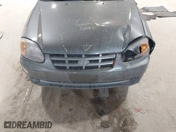 2004 Hyundai Accent GL z VIN KMHCG45C44U528783, wystawiony jako IAAI lot #41535104 z przebiegiem Nie podano mil oraz . Historia ofert i sprzedaży dostępna na DreamBid. Obrazek 12.