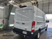 ✅ 2022 Ford E-Transit Cargo • VIN: 1FTBW9CK9NKA20025 • Лот: 42946624. Опубликован ранее на IAAI с пробегом 52 238 миль. Бесплатный доступ к архиву аукционных продаж из США и подробный отчёт об истории автомобиля на DreamBid. Изображение 1.