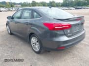 ✅ 2017 Ford Focus Titanium • VIN: 1FADP3J20HL238784 • Лот: 43216971. Опубликован ранее на IAAI с пробегом 60 239 миль. Бесплатный доступ к архиву аукционных продаж из США и подробный отчёт об истории автомобиля на DreamBid. Изображение 3.