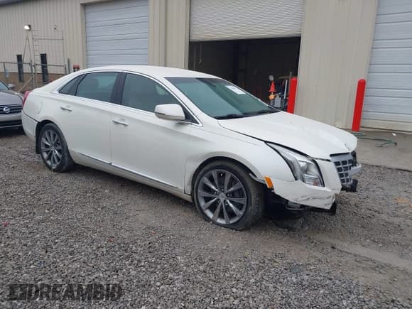 ✅ 2013 Cadillac XTS • VIN: 2G61N5S30D9182193 • Lot: 43547622. Wystawiony na IAAI z przebiegiem 61 221 mil. Bezpłatny archiwum sprzedaży aukcyjnych z USA i szczegółowy raport historii pojazdu na DreamBid. Zdjęcie 1.
