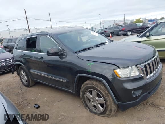 ✅ 2011 Jeep Grand Cherokee Laredo • VIN: 1J4RR4GG2BC696671 • Lot: 43253415. Listed on IAAI with 142,670 mi. Free auction sales archive from the USA and detailed vehicle history report at DreamBid. Image 1.