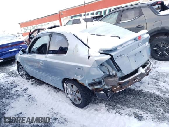 2004 Hyundai Accent GL z VIN KMHCG35C04U314674, wystawiony jako Copart lot #86047454 z przebiegiem 65 705 mil mil oraz Szkoda całkowita • Salvage title. Historia ofert i sprzedaży dostępna na DreamBid. Obrazek 2.