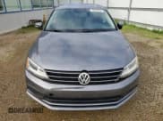 ✅ 2015 Volkswagen Jetta SE • VIN: 3VWD17AJ3FM412138 • Лот: 92463395. Опубликован ранее на Copart с пробегом 99 775 миль. Бесплатный доступ к архиву аукционных продаж из США и подробный отчёт об истории автомобиля на DreamBid. Изображение 5.