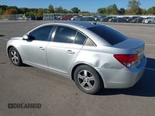 ✅ 2014 Chevrolet Cruze 1LT • VIN: 1G1PC5SB2E7258013 • Lot: 43417395. Listed on IAAI with 219,609 mi. Free auction sales archive from the USA and detailed vehicle history report at DreamBid. Image 3.