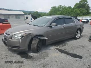 ✅ 2012 Chevrolet Malibu 1LS • VIN: 1G1ZB5E05CF316317 • Lot: 59702495. Listed on Copart with 137,824 mi. Free auction sales archive from the USA and detailed vehicle history report at DreamBid. Image 1.