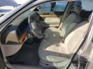 ✅ 2002 Lincoln Continental • VIN: 1LNHM97V32Y647800 • Lot: 75240874. Listed on Copart with 71,689 mi. Free auction sales archive from the USA and detailed vehicle history report at DreamBid. Image 7.