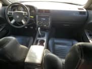 ✅ 2009 Dodge Challenger R/T • VIN: 2B3LJ54T29H602856 • Lot: 82229284. Wystawiony na Copart z przebiegiem 355 225 mil. Bezpłatny archiwum sprzedaży aukcyjnych z USA i szczegółowy raport historii pojazdu na DreamBid. Zdjęcie 8.